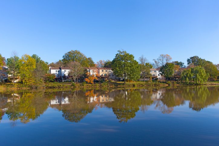 Suburban neighborhood of Falls Church in autumn near water in Virginia, USA.